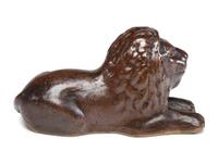A Scarce Ohio Stoneware Recumbent Lion Bank