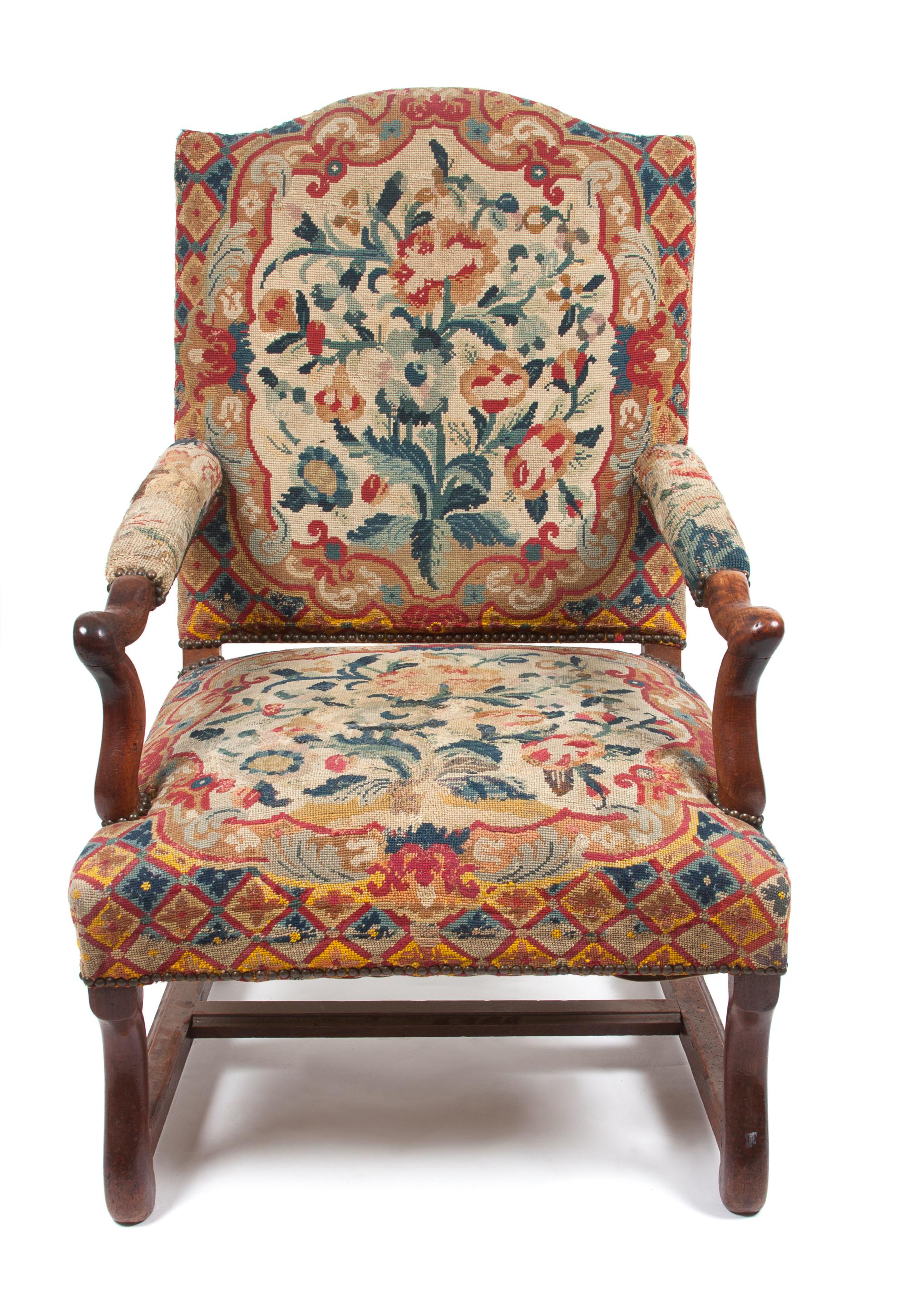 A French Provincial Tapestry Upholstered Walnut Fauteuil Height 41 1/2 inches.