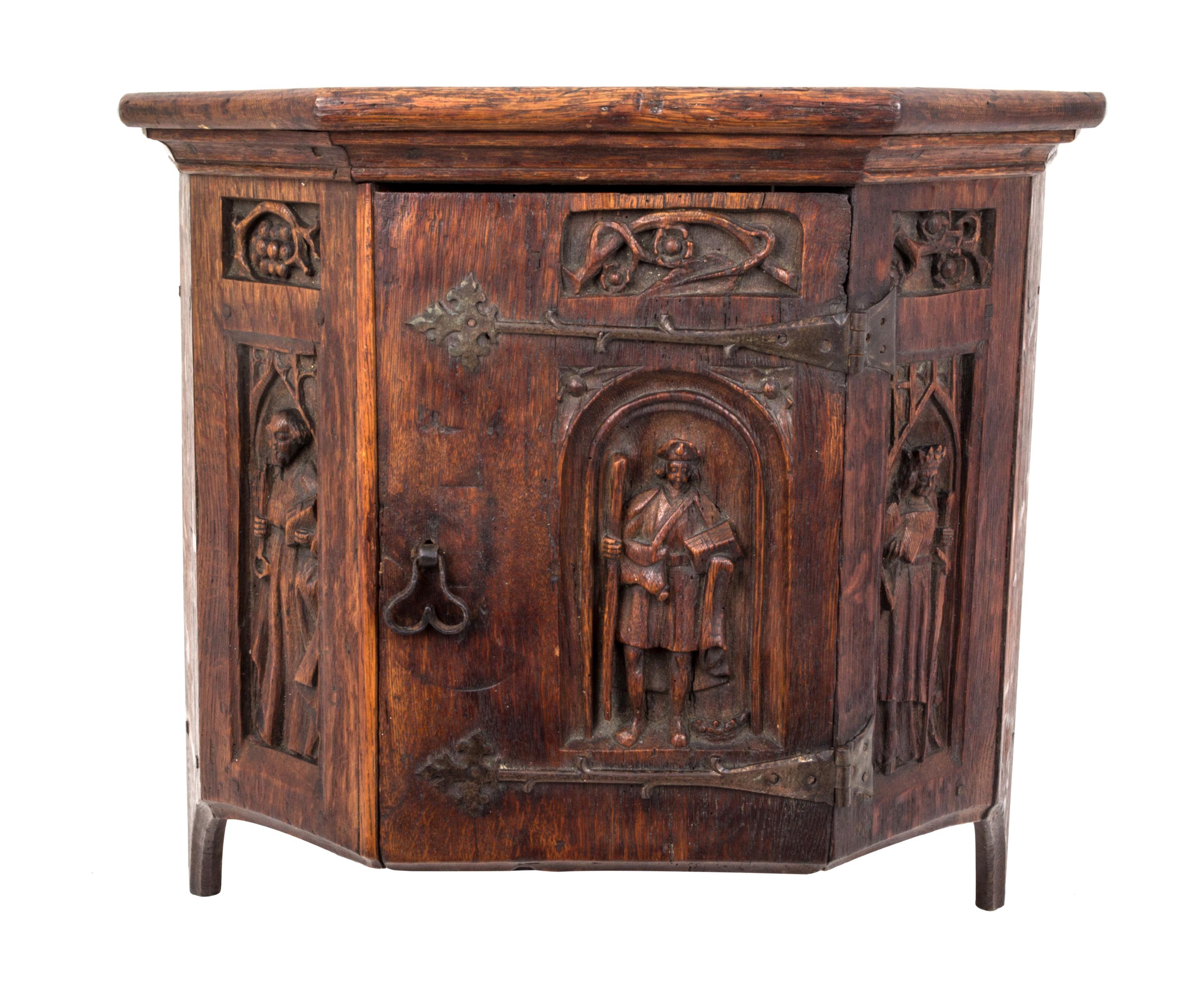 A Gothic Oak Hanging Cabinet Height 19 3/4 x width 20 1/2 x depth 10 inches.