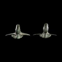 A Pair of Etruscan Bronze Vessel Handles