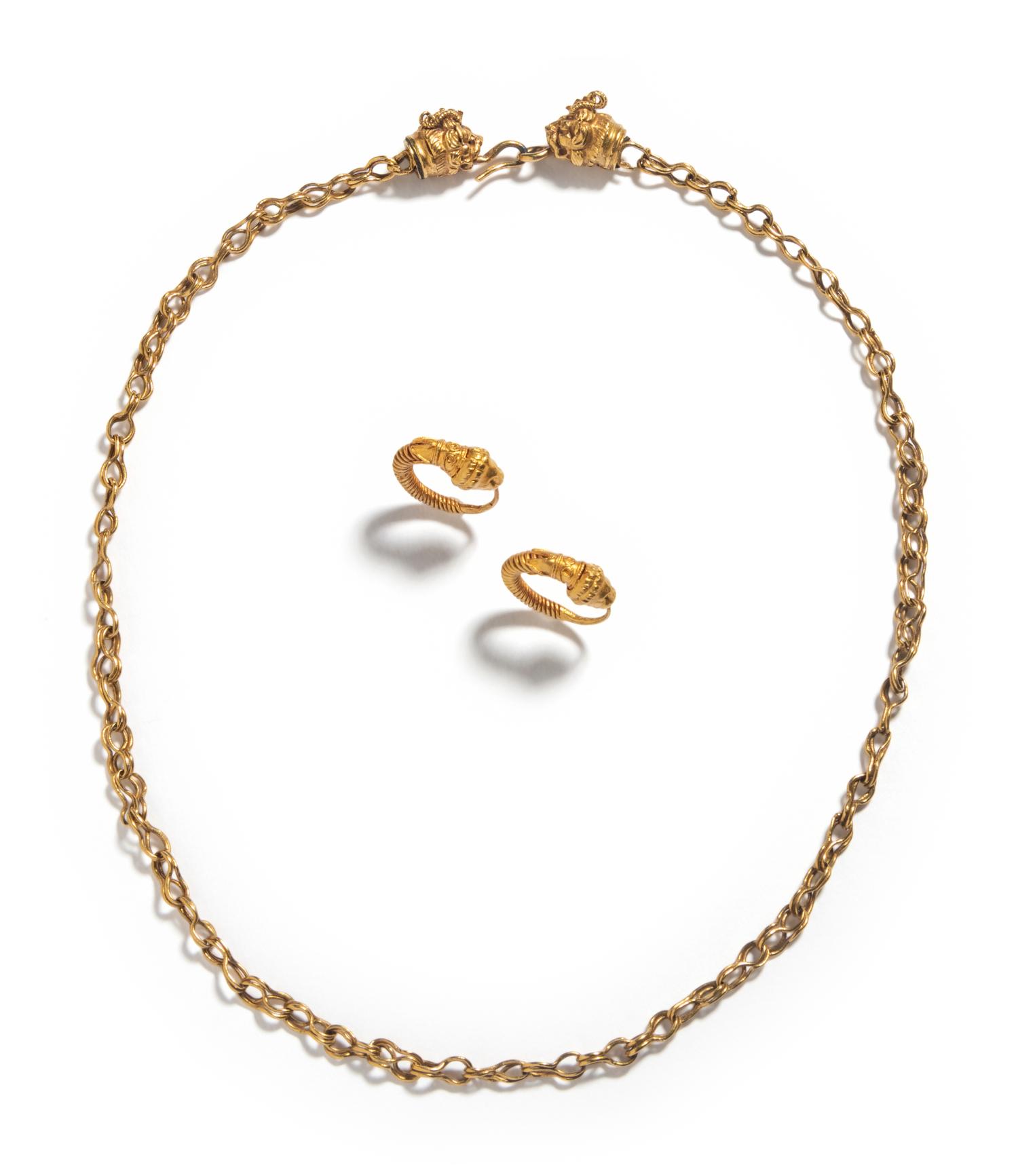 A Hellenistic Gold Necklace with a Pair of Hoop Earrings each with Lion-Head Terminals
