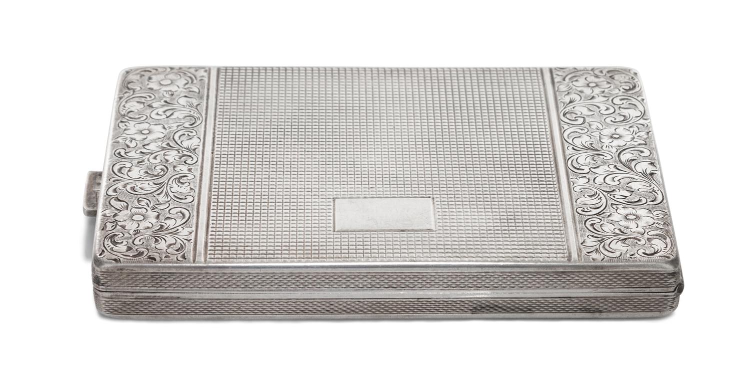 A Silver-Plate Cigarette Case, 20th Century, of rectangular hinged form with foliate and textured external decoration and gilt interior