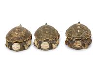 Three Ceramic Turtle-form Boxes and a Pair of Glazed Ceramic Sheep