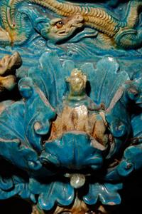 A Turquoise and Ochre Glazed Tileworks Tripod Incense Burner