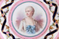 A Set of Twelve Sèvres Style Porcelain Plates Depicting Courtiers