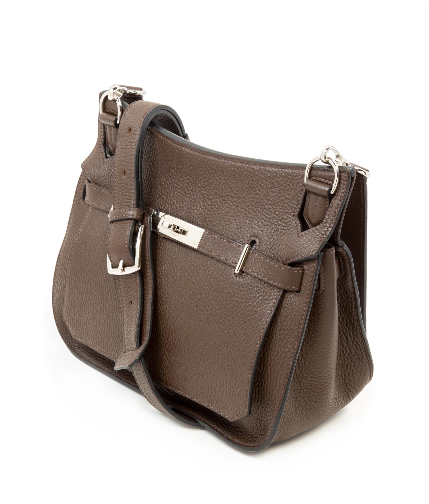 An Hermès Chocolate Taurillon Clemence Jypsiere 28cm Bag, 11" x 8.5" x 5".