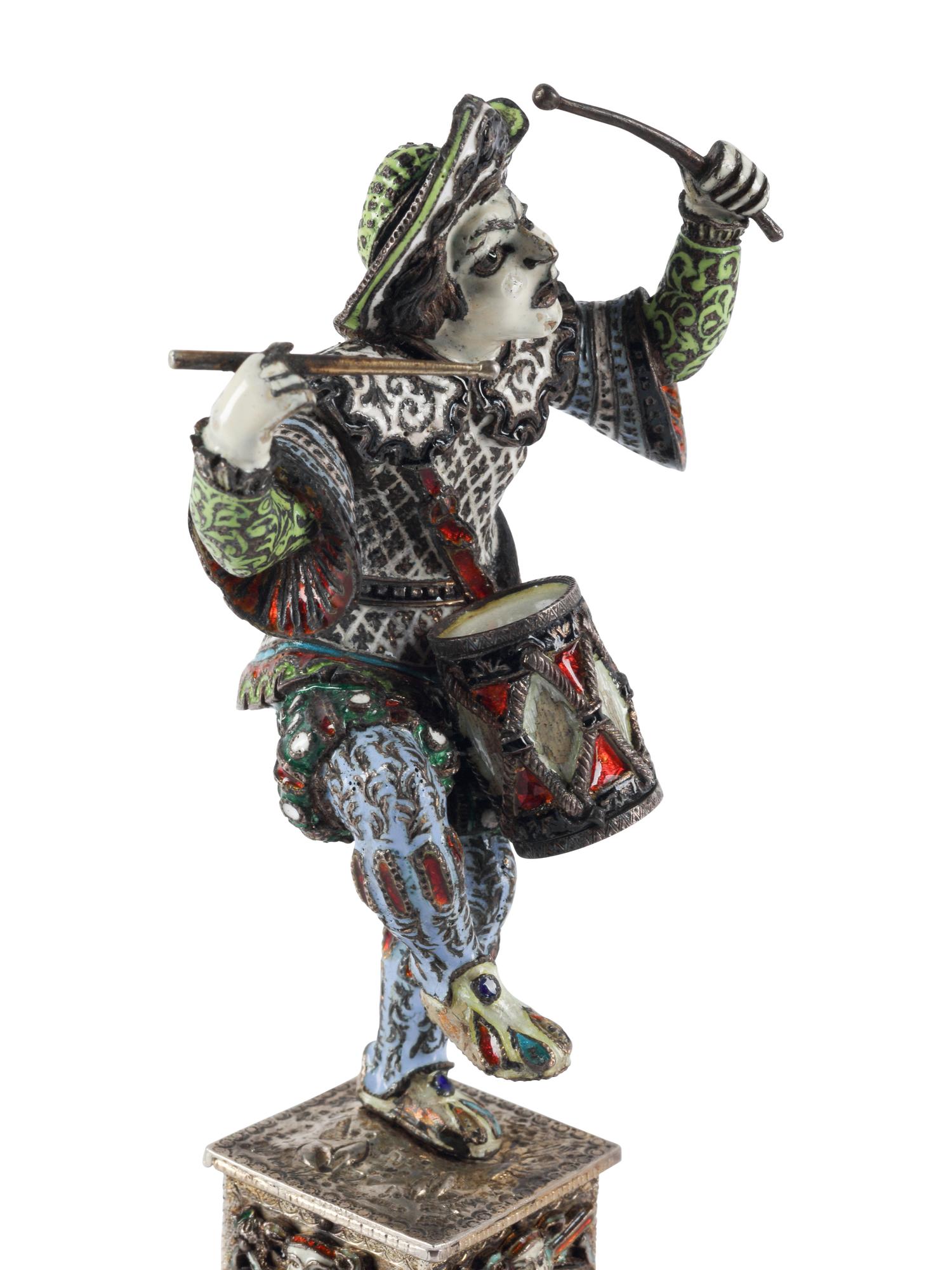 An Austrian Silver, Enamel and Hardstone Mounted Figure of a Drummer Clown