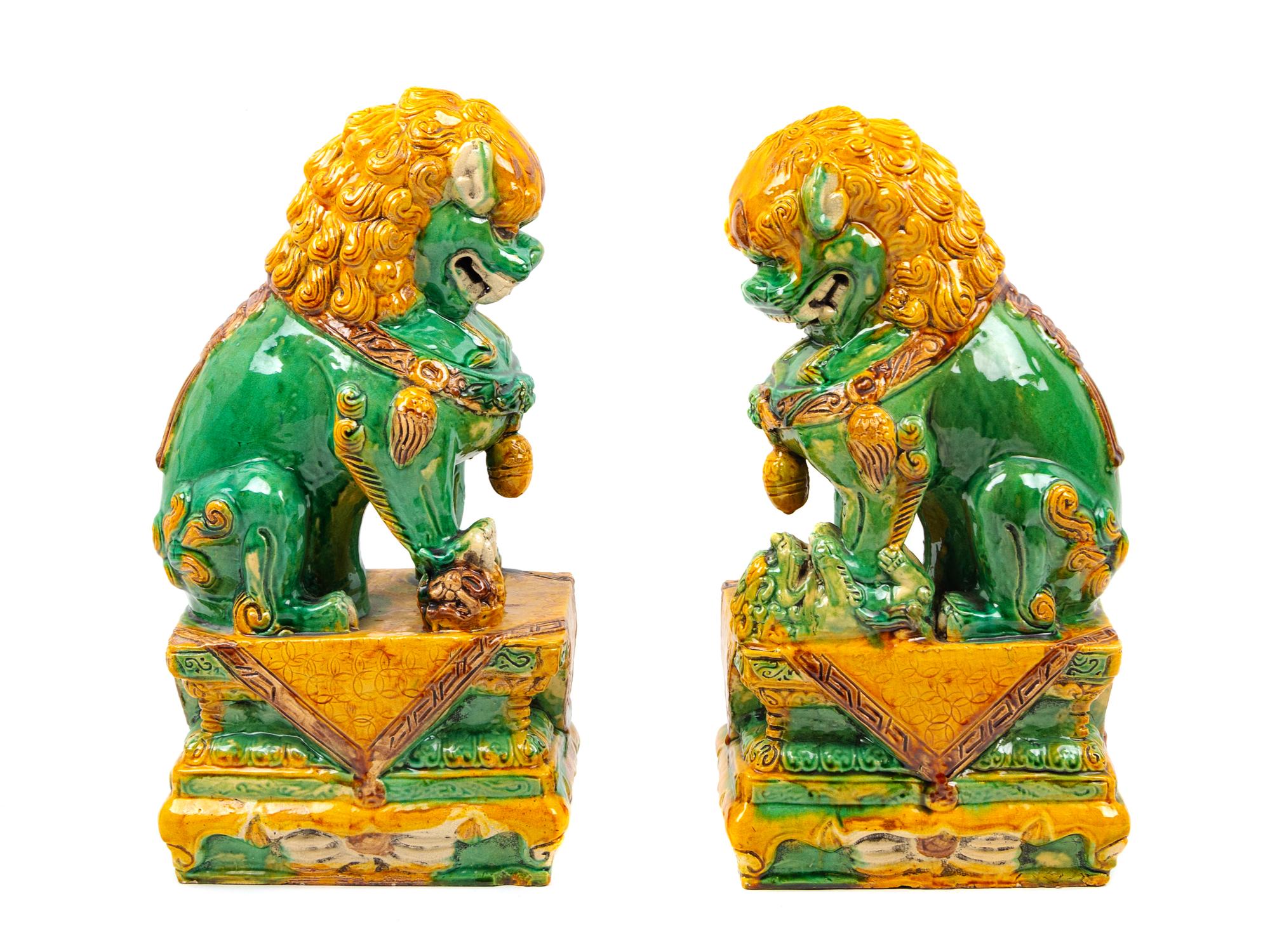 A Pair of Chinese Sancai Glazed Porcelain Fu Lions