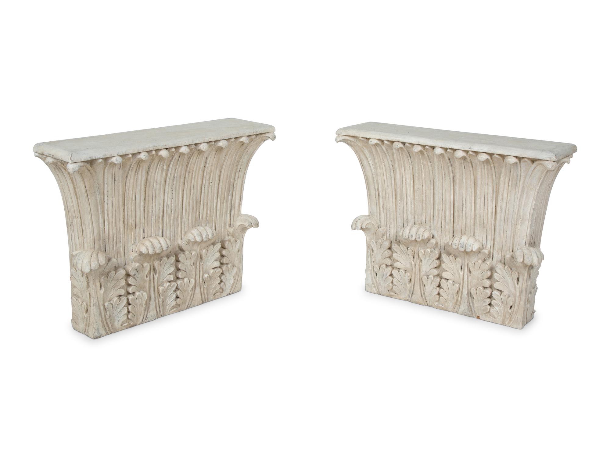 An Assembled Pair of Carved Wood Corinthian Column Capitals — CIRCA 1930