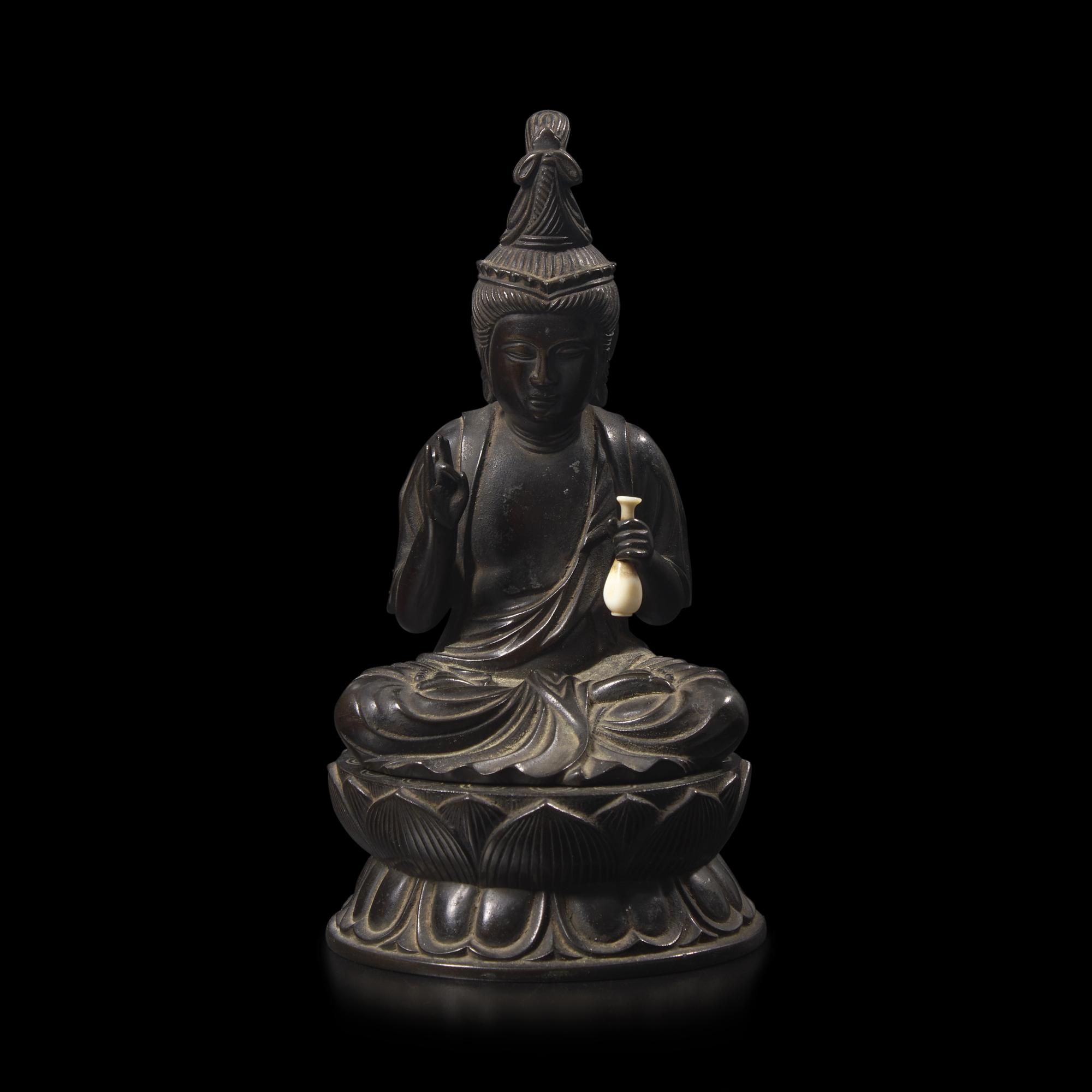A Japanese Patinated Bronze Seated Bosatsu and Lotus Stand, with Signature of Watanabe Doi, Meiji Period