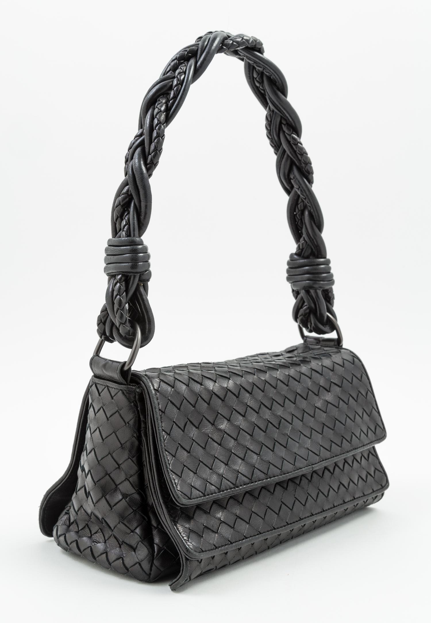 A Bottega Veneta Black Intrecciato Double Flap Handbag, 10" x 5" x 4"; Strap drop: 9".