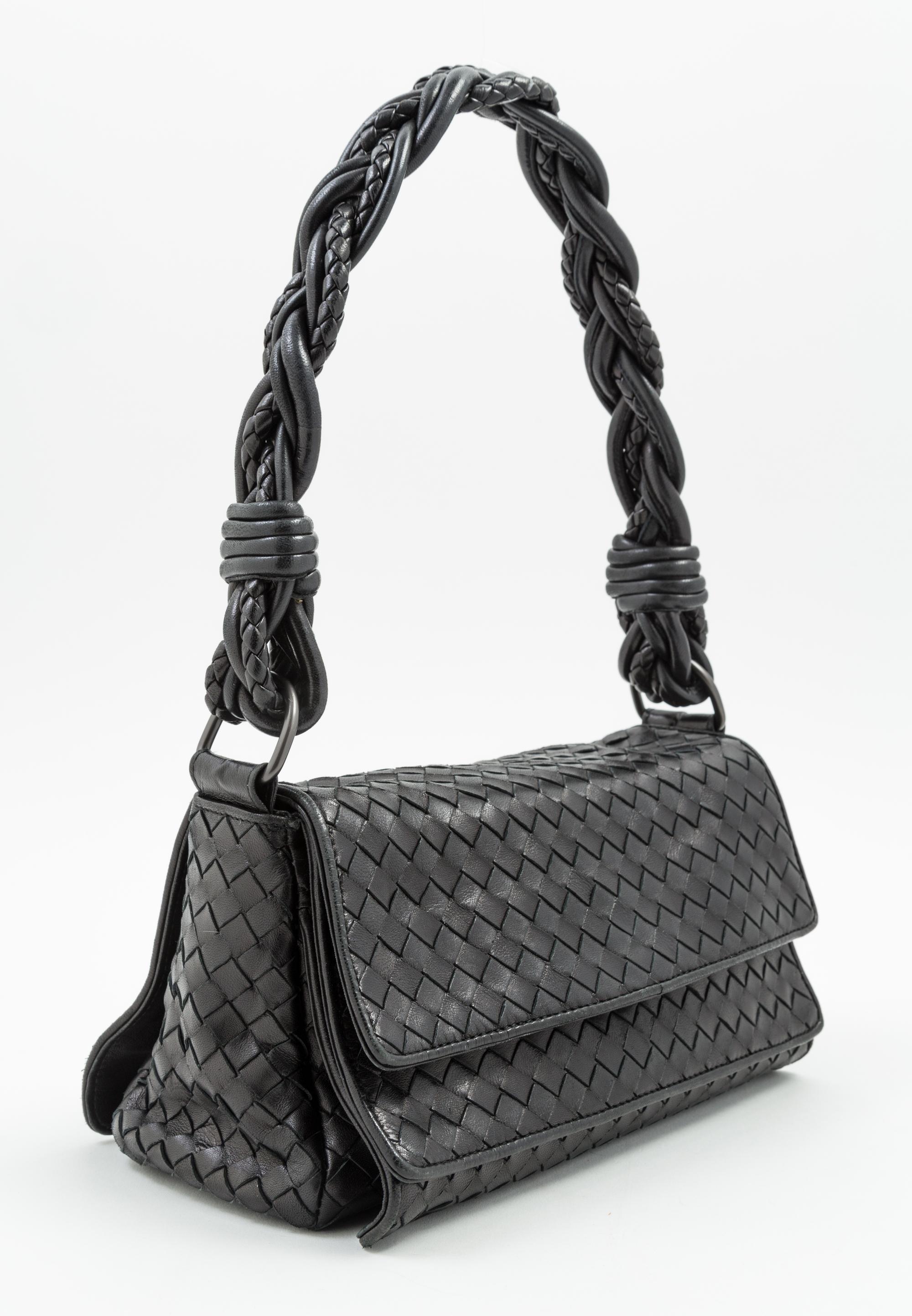 A Bottega Veneta Black Intrecciato Double Flap Handbag, 10" x 5" x 4"; Strap drop: 9".