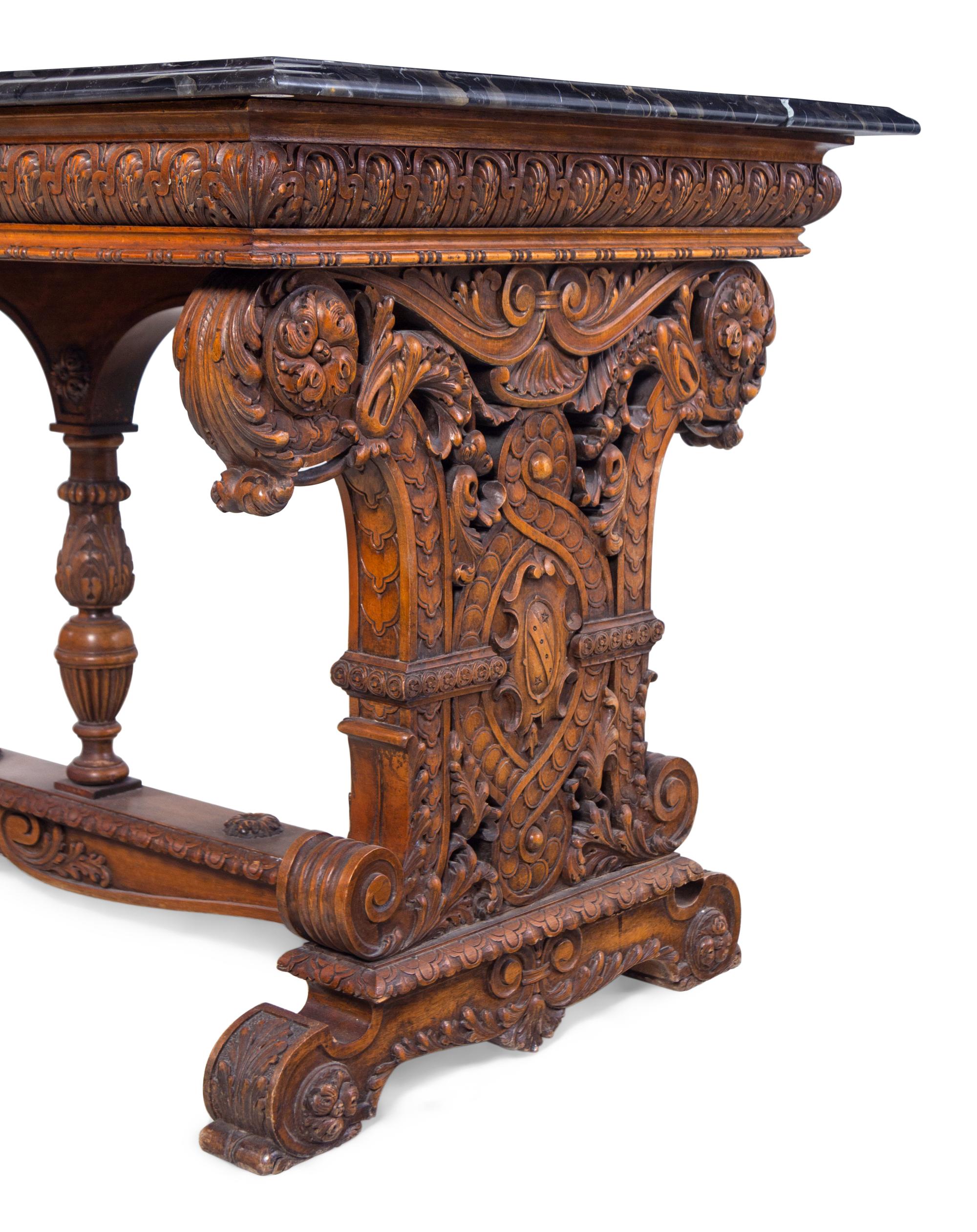 A Karpen Renaissance Revival Carved Oak Marble-Top Table