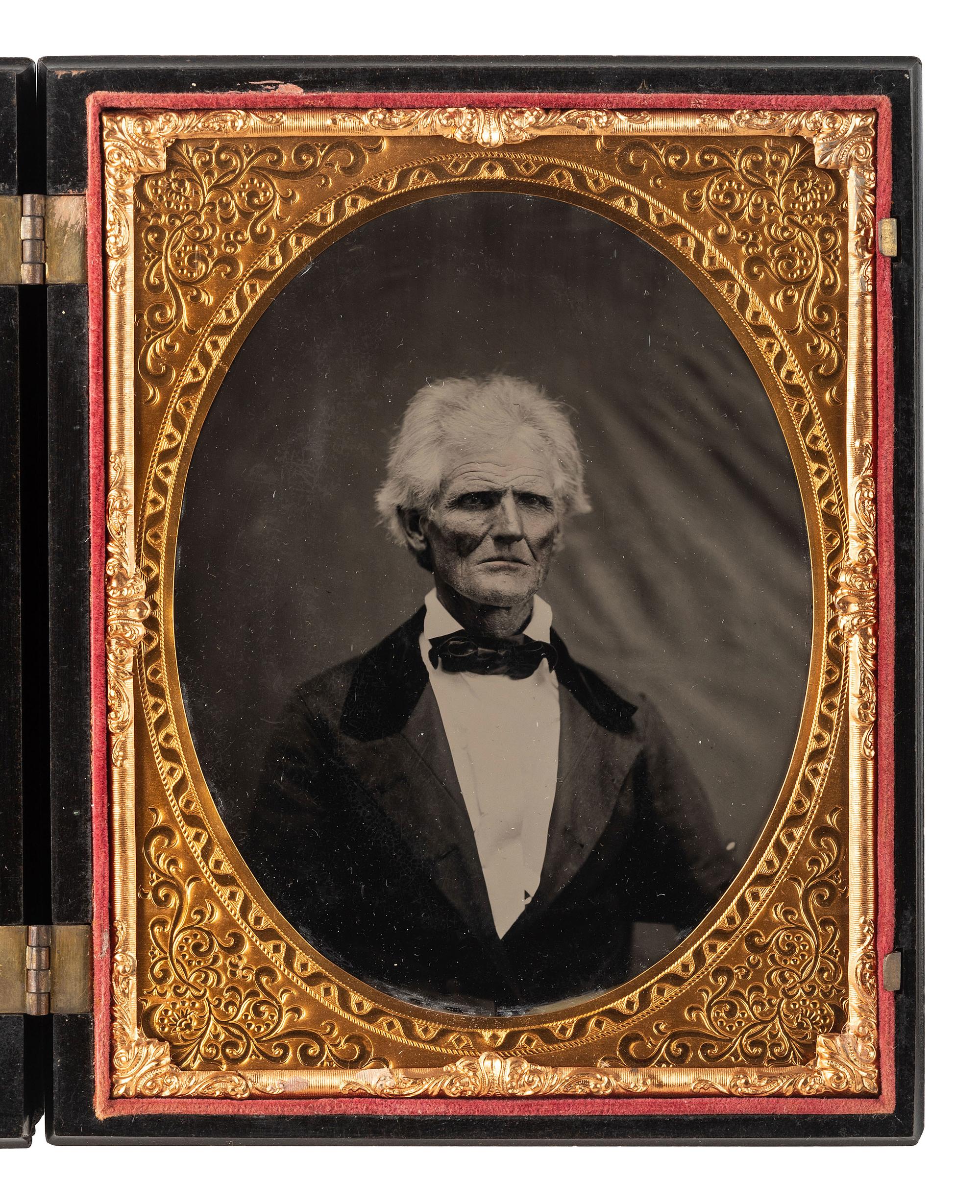 [EARLY PHOTOGRAPHY]. 3 half plate figural Union cases, one containing tintype of a wedding couple.