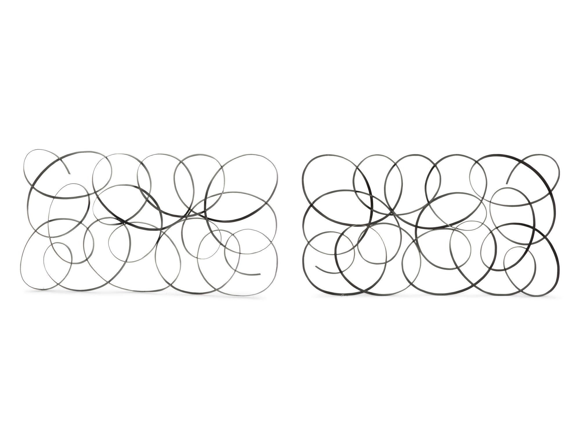A Pair of Black Painted Metal Wall Panels after Klaus Walk