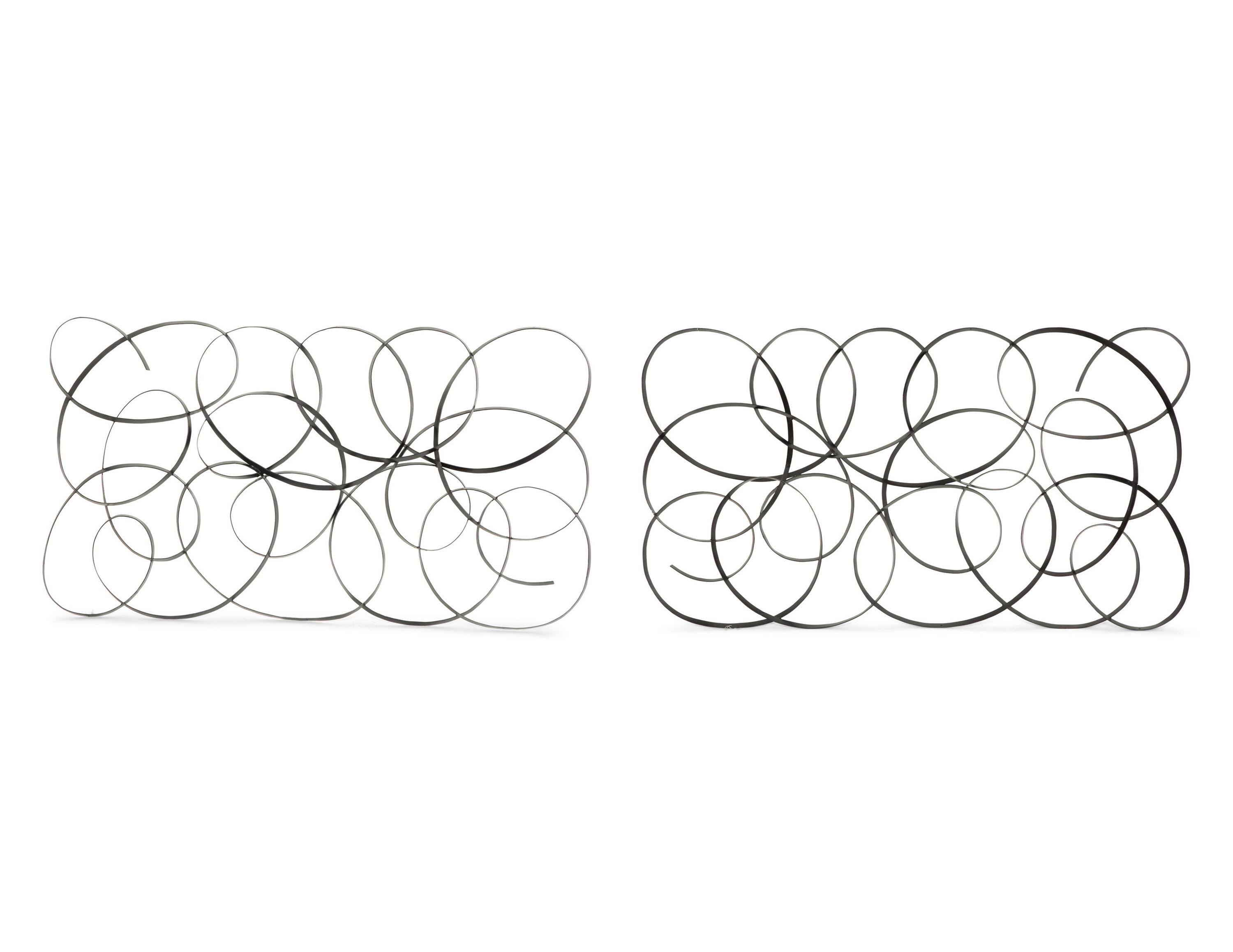 A Pair of Black Painted Metal Wall Panels after Klaus Walk
