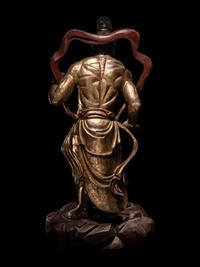 A Pair of Chinese Gilt and Red Lacquered Wood Figures of Wrathful Guardians