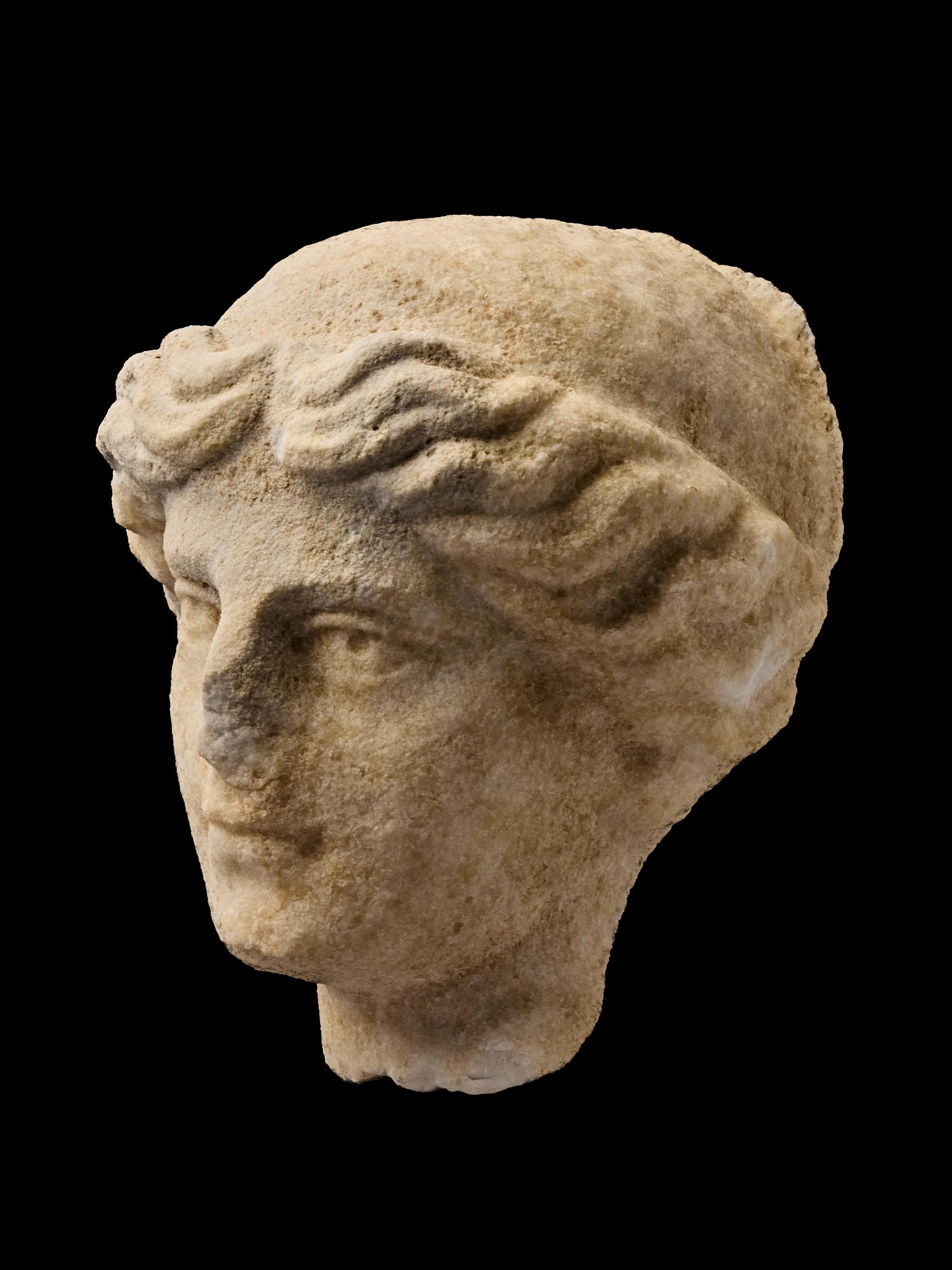 A Roman Marble Head of a Goddess