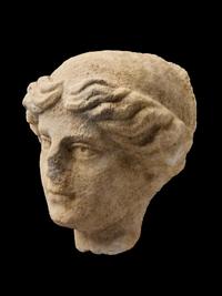 A Roman Marble Head of a Goddess