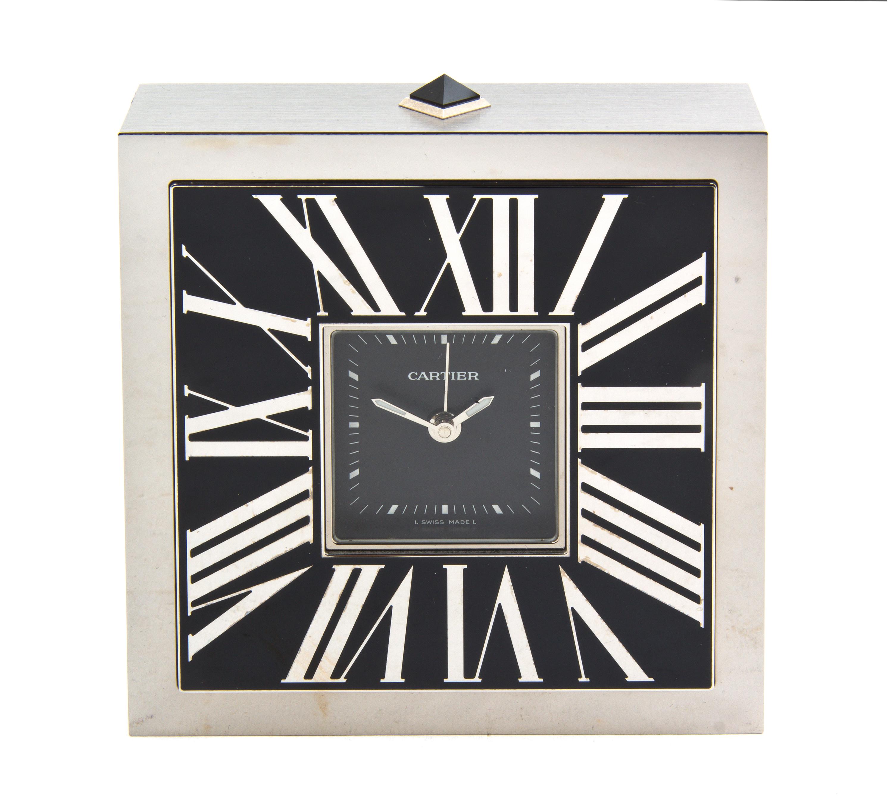 An Art Deco Style Travel Alarm Clock, Cartier, Width 3 3/4 inches.