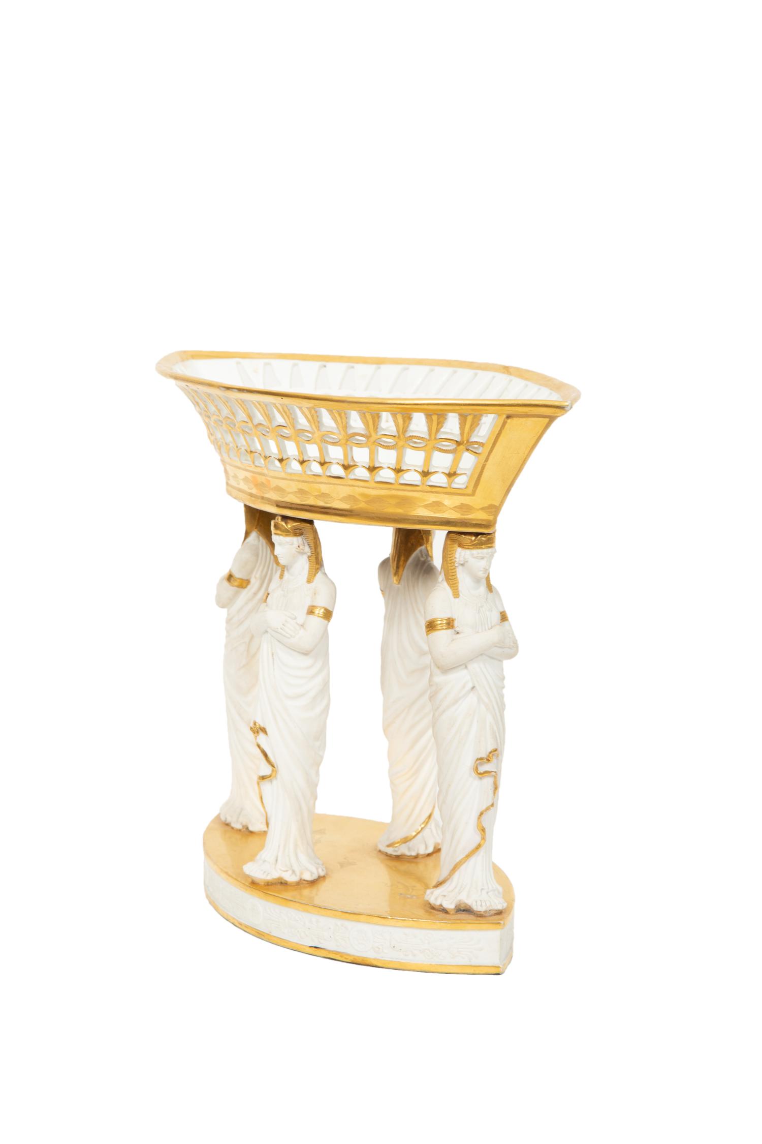 A Paris Porcelain Egyptian Revival Parcel Gilt Bisque Porcelain Centerpiece