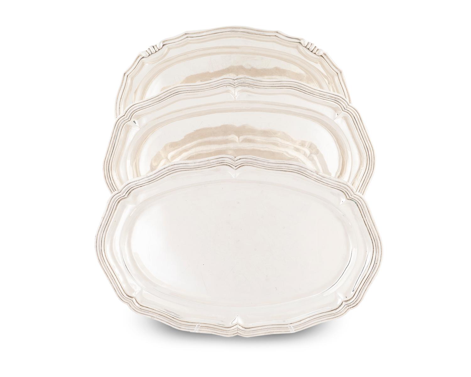 A Set of Three Mexican Silver Graduated Serving Trays — 20TH CENTURY