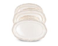 A Set of Three Mexican Silver Graduated Serving Trays — 20TH CENTURY