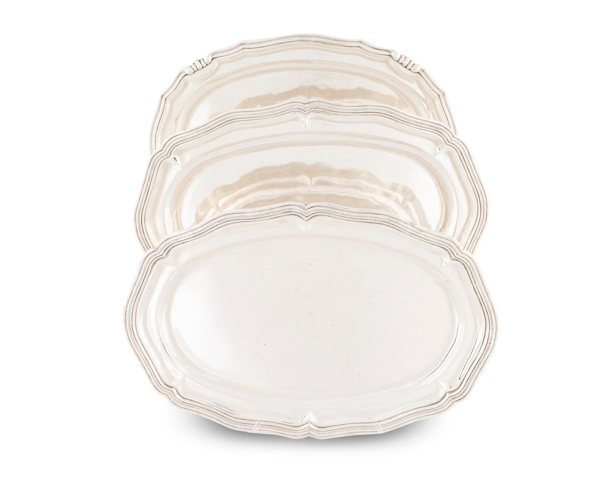 A Set of Three Mexican Silver Graduated Serving Trays — 20TH CENTURY