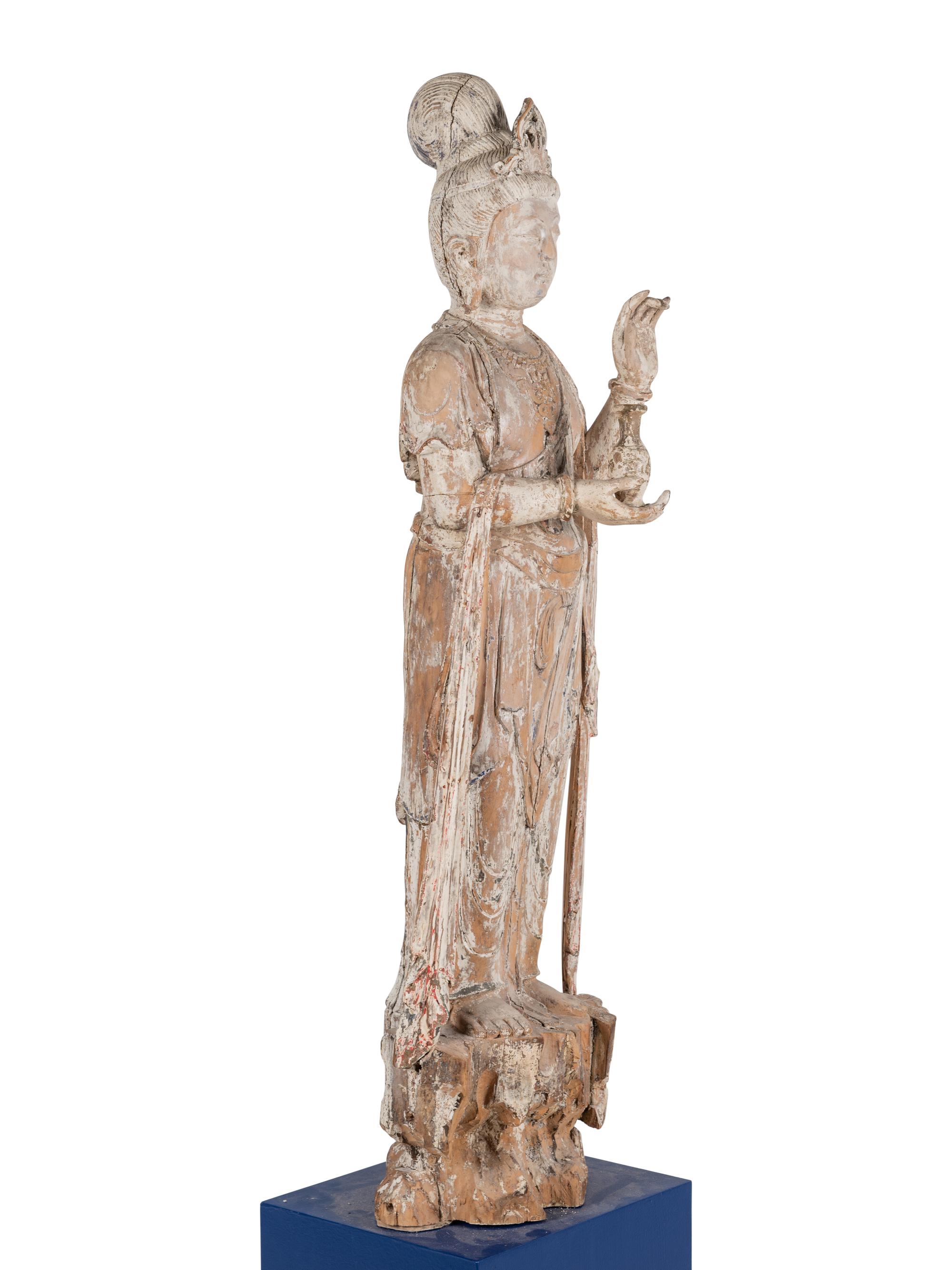 A Chinese Carved Wood Figure of Standing Guanyin