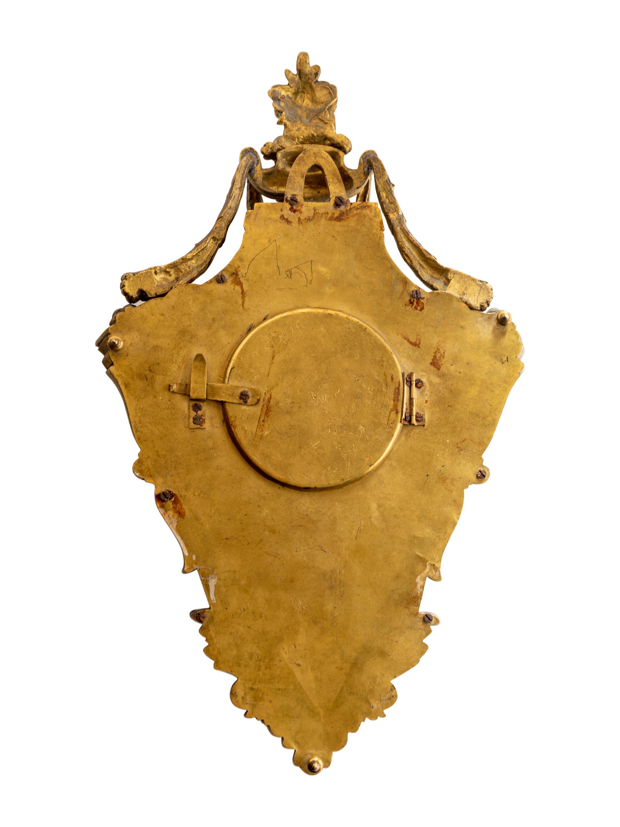 A Louis XVI Style Gilt Bronze Cartel Clock