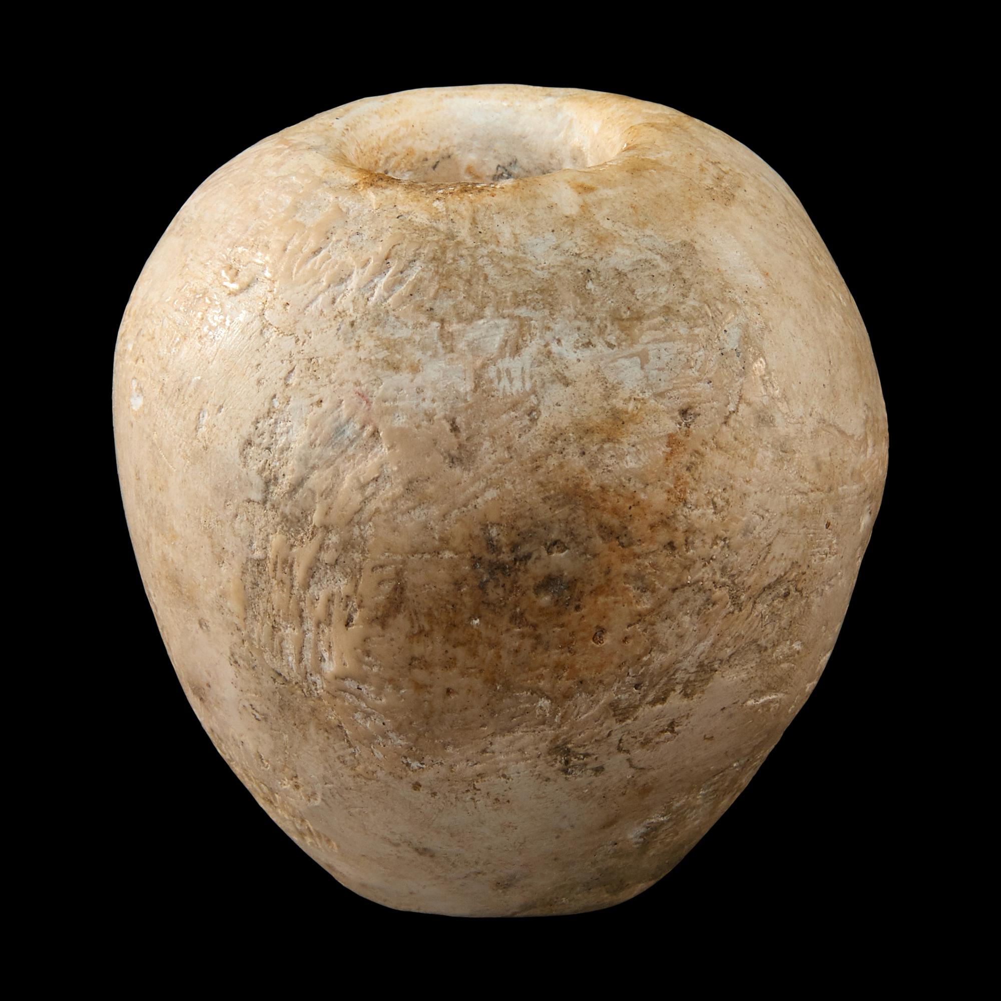An Egyptian Limestone Mace Head