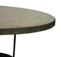 A Contemporary Carved Wood Circular Dining Table