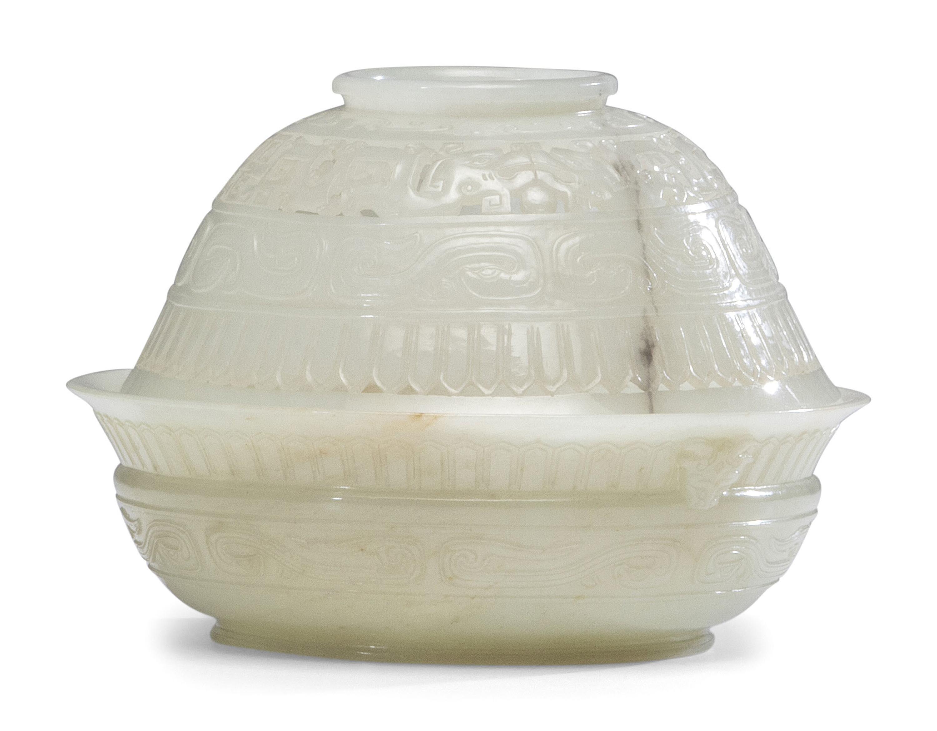 A Chinese Carved and Pierced 'Archaistic' White Jade Bowl and Cover