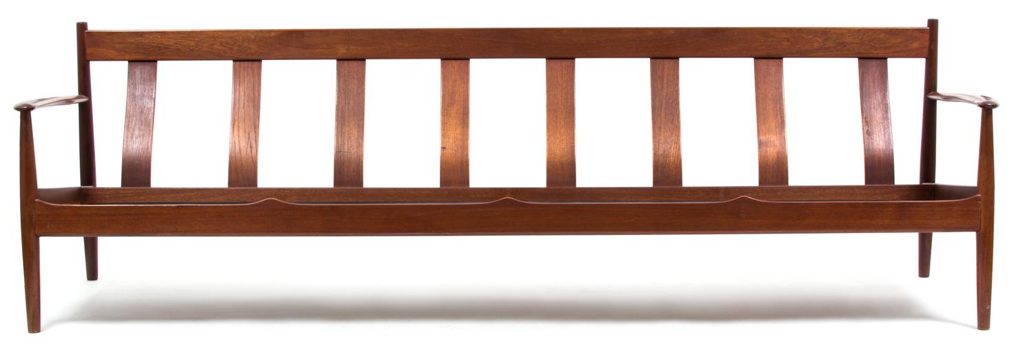 A Modern Carved Wood Bench Height 28 x width 91 x depth 27 inches. — 20TH CENTURY