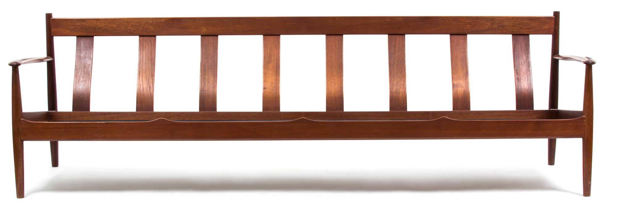 A Modern Carved Wood Bench Height 28 x width 91 x depth 27 inches. — 20TH CENTURY