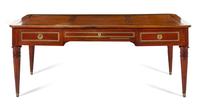 A Louis XVI Brass Mounted Mahogany Bureau Plat