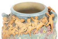 An Earthenware Vase Depicting The Struggle for Life Attributed to Louis-Robert Carrier-Belleuse (French, 1848-1913)