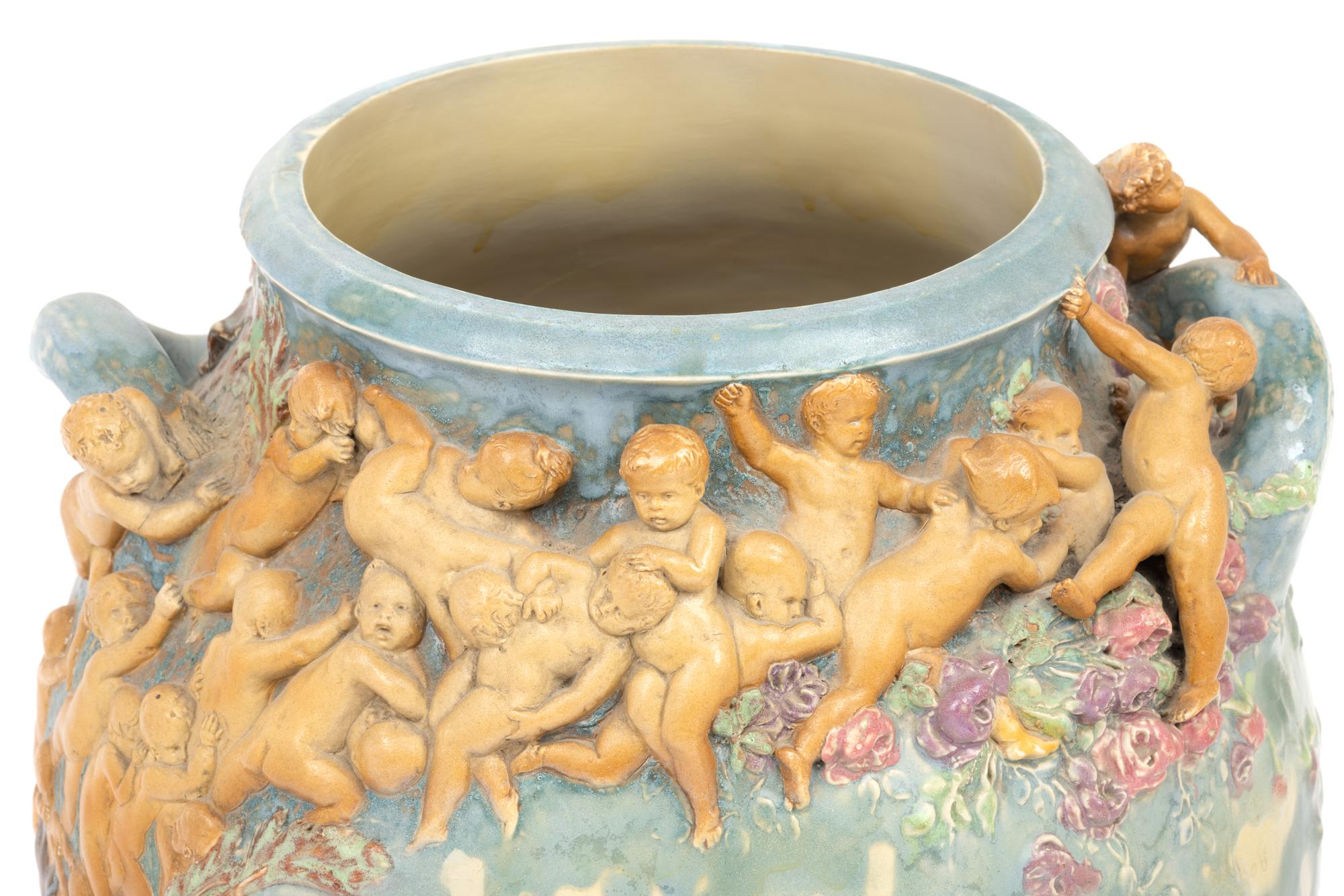 An Earthenware Vase Depicting The Struggle for Life Attributed to Louis-Robert Carrier-Belleuse (French, 1848-1913)