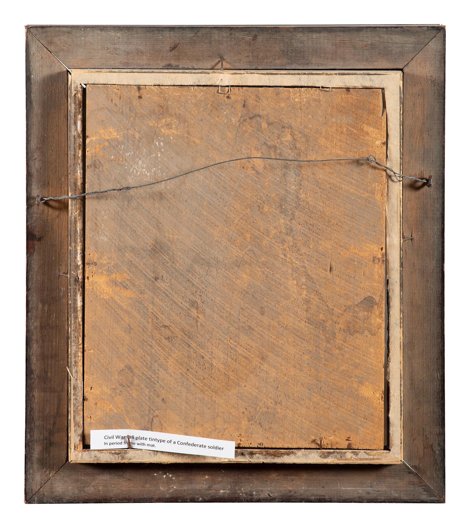 [CIVIL WAR]. Whole plate hand-painted tintype of a Confederate soldier.