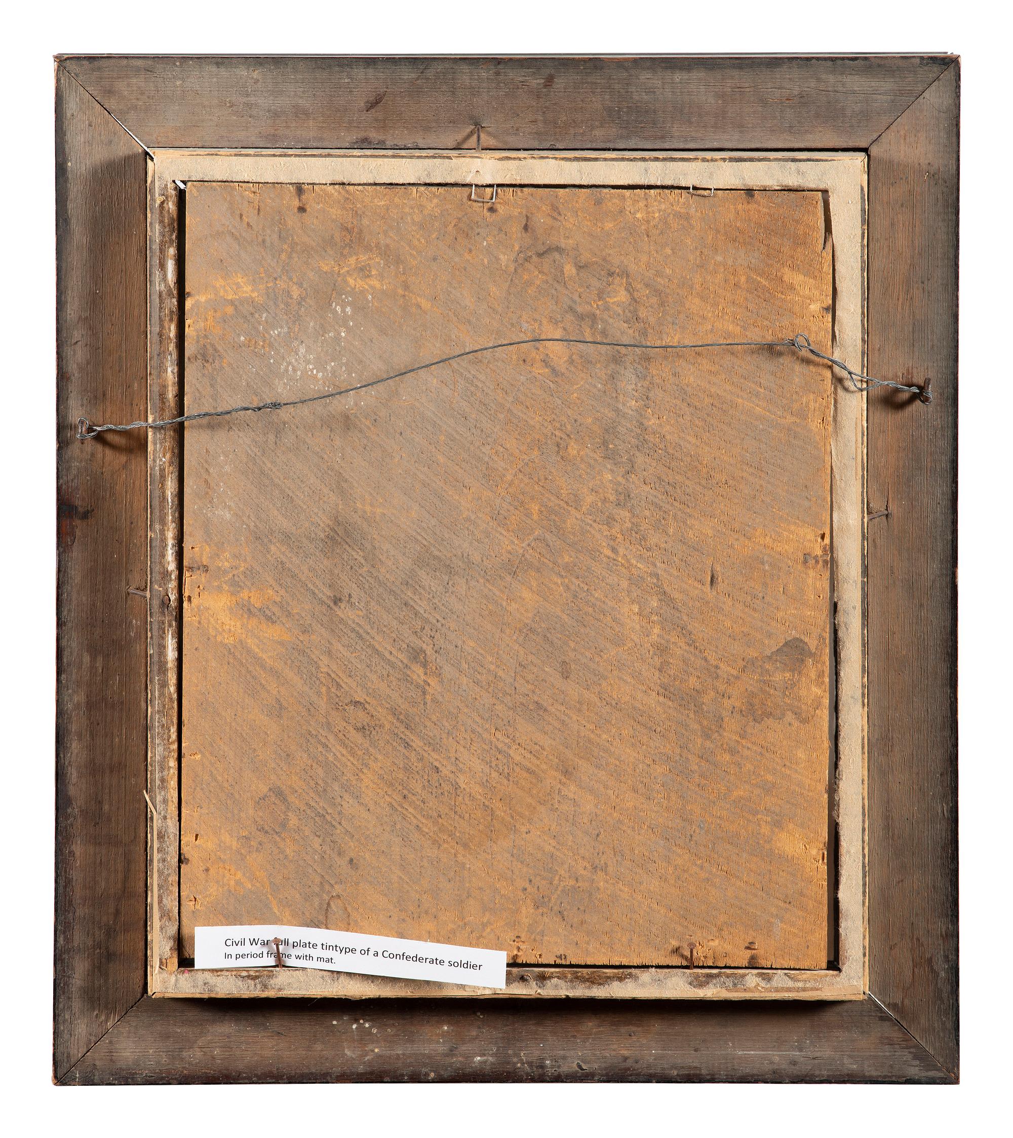 [CIVIL WAR]. Whole plate hand-painted tintype of a Confederate soldier.