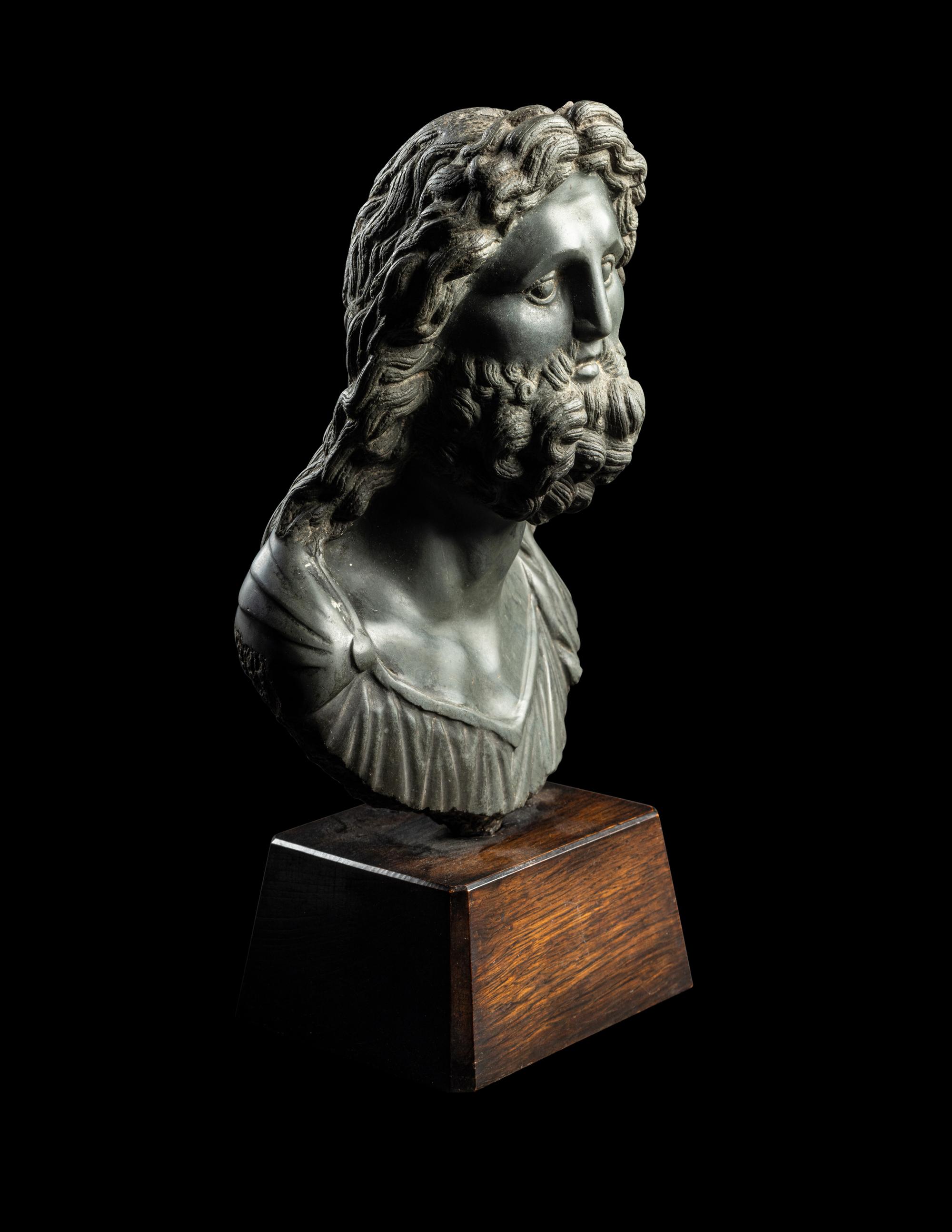 A Roman Green Schist Bust of Jupiter
