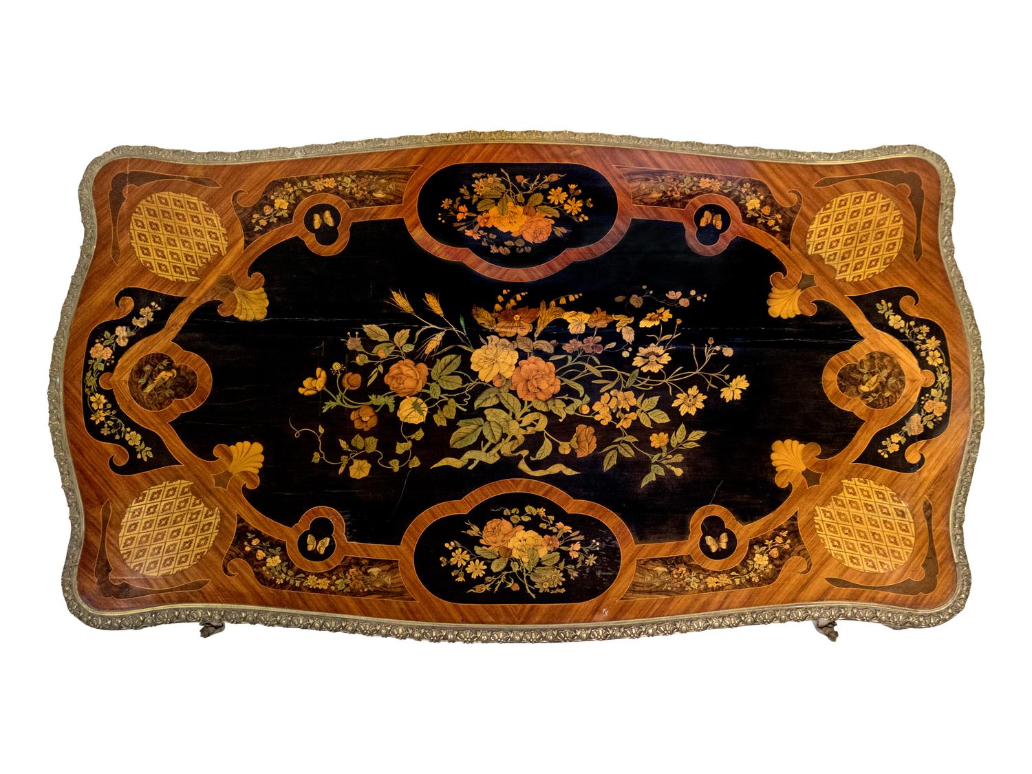 A French Gilt-Bronze-Mounted Kingwood, Tulipwood and Marquetry Centre Table