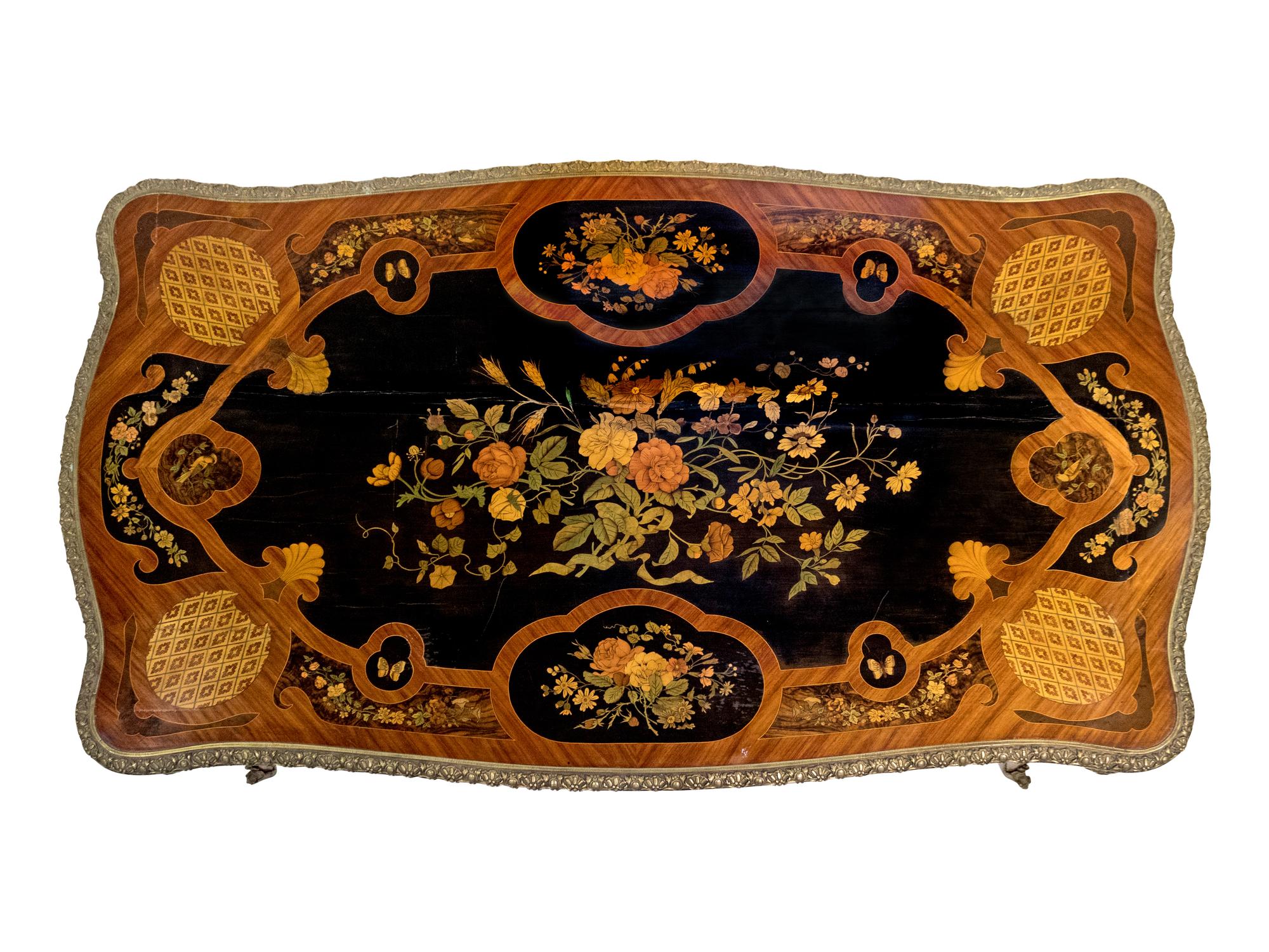 A French Gilt-Bronze-Mounted Kingwood, Tulipwood and Marquetry Centre Table