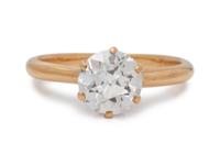 A 14 Karat Yellow Gold and Diamond Ring,