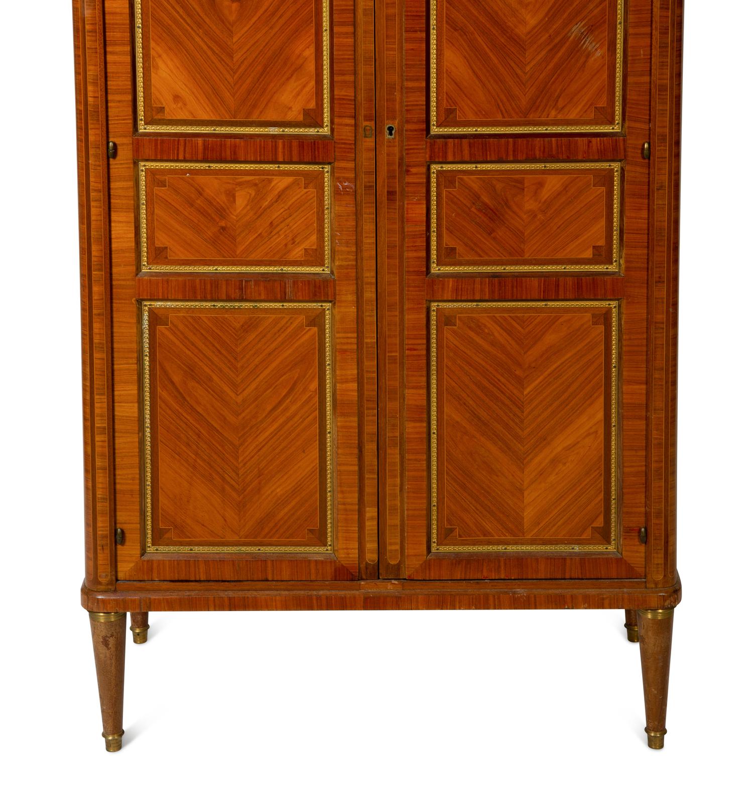 A Louis XVI Style Gilt Bronze Mounted Tulipwood Marble-Top Cabinet