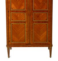 A Louis XVI Style Gilt Bronze Mounted Tulipwood Marble-Top Cabinet