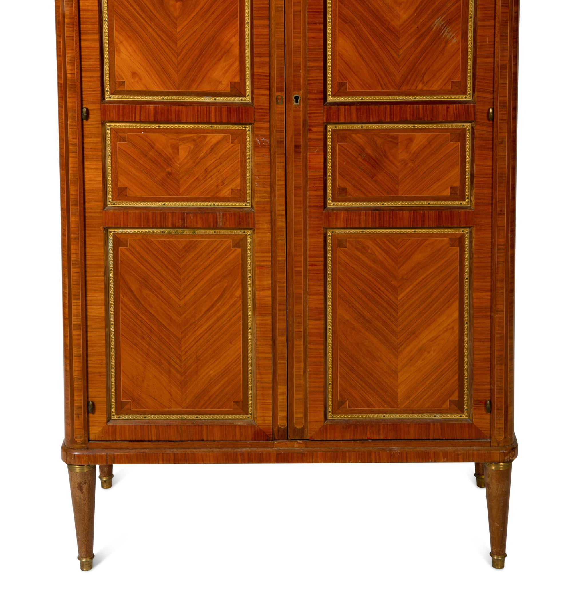 A Louis XVI Style Gilt Bronze Mounted Tulipwood Marble-Top Cabinet