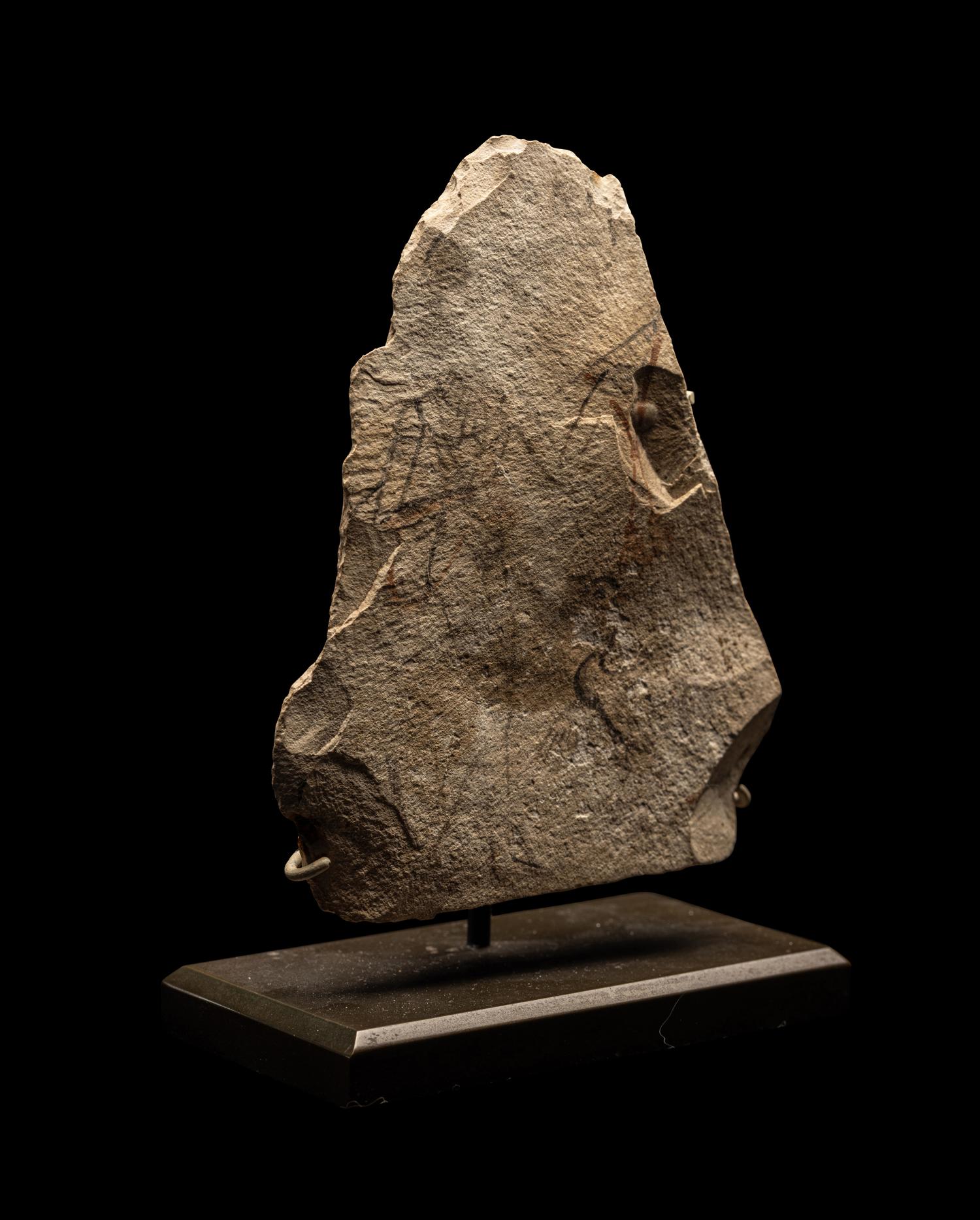 An Egyptian Limestone Ostracon with a Female Musician and Singing Goose
