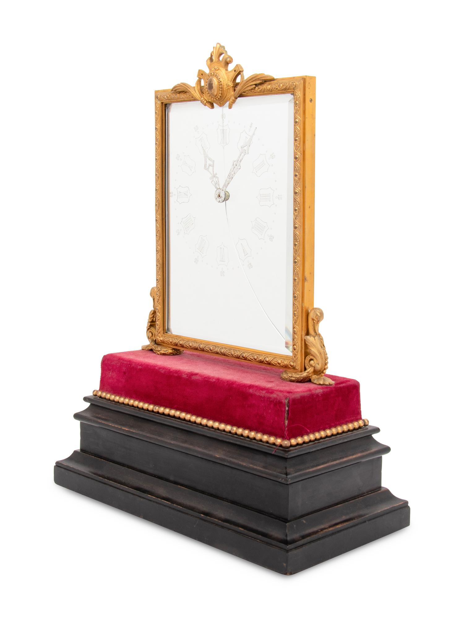 A French Gilt-Bronze Mounted Mystery Clock