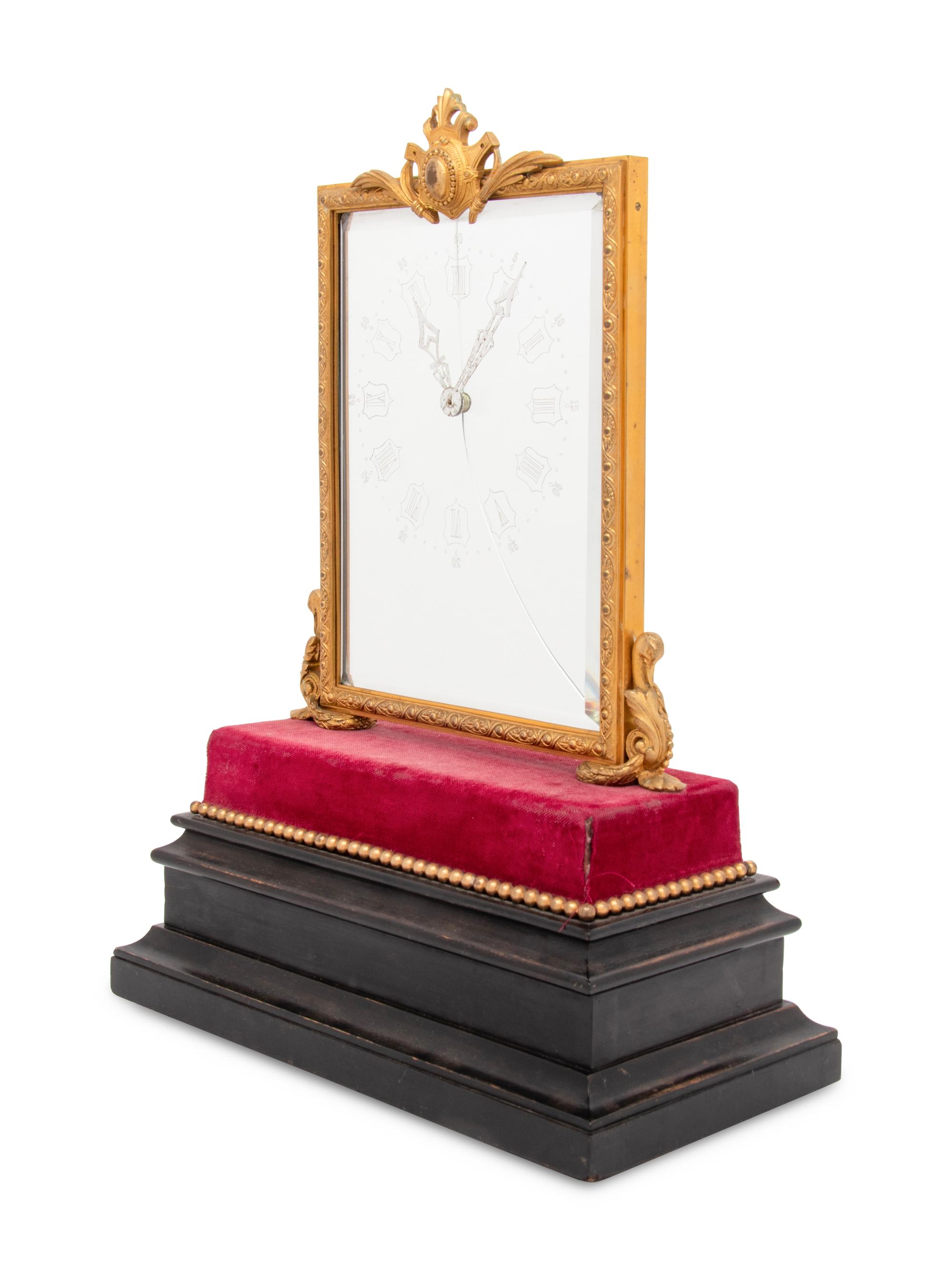 A French Gilt-Bronze Mounted Mystery Clock